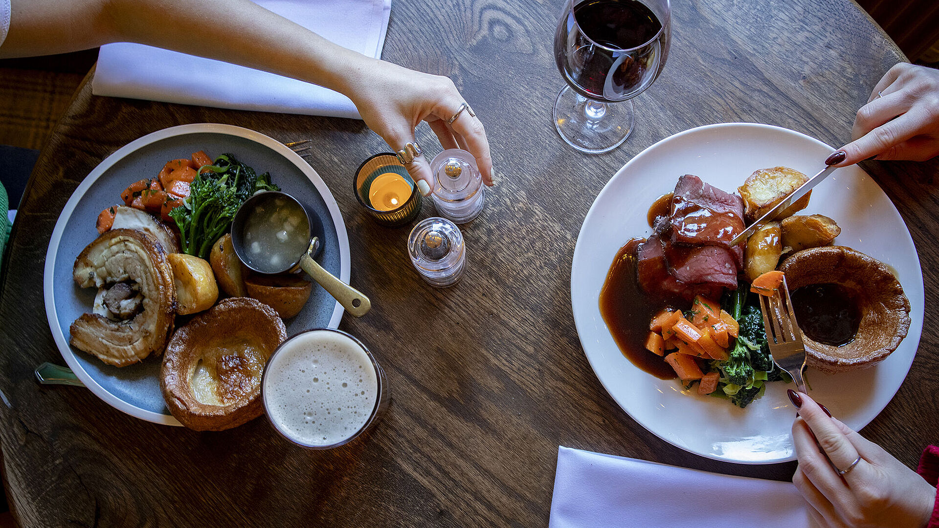Roast beef and roast pork with potatoes and vegetables